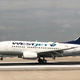 A Westjet plane lands at La Guardia International Airport in New York on July 29, 2018.